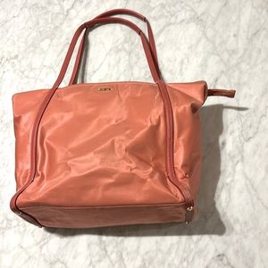 Tumi tote bag purse for office.  Salmon / pink color.  Good condition.